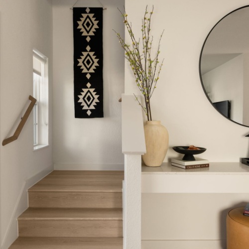 a foyer and open entry if a townhome for rent at a BTR community in Frisco