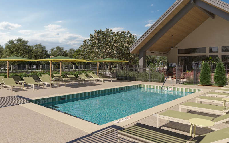 a pool with a lounge chair and umbrella